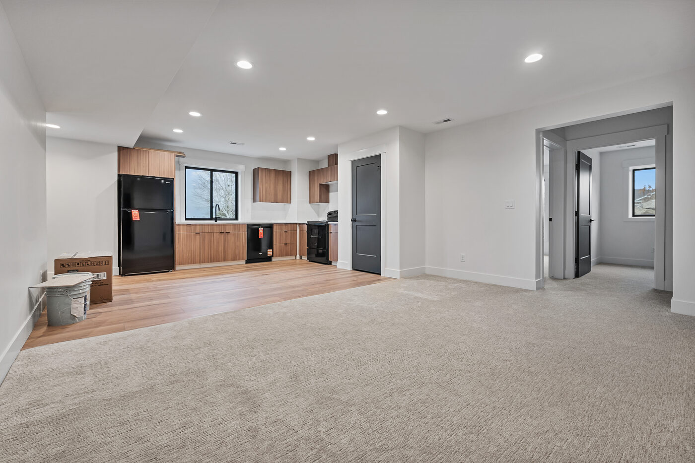 Basement guest suite with private kitchen and living area — Rexburg home with in-law suite